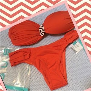 Brazilian cut bikini in deep orange.
